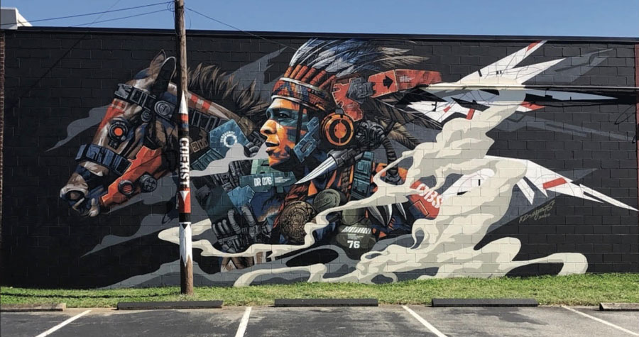 #indigenouspeopleunite mural by Dragon76 in Greensboro, NC